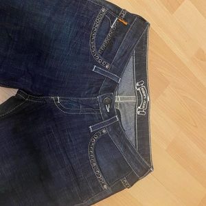 Dark denim Robins Jeans with black stone accents